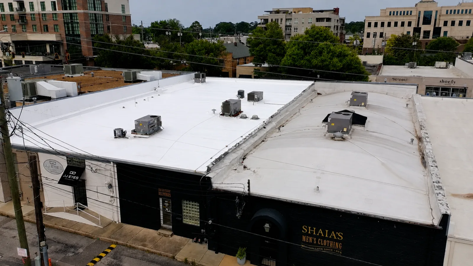 White TPO membrane roof with rooftop HVAC on the Shaia's building, Homewood AL